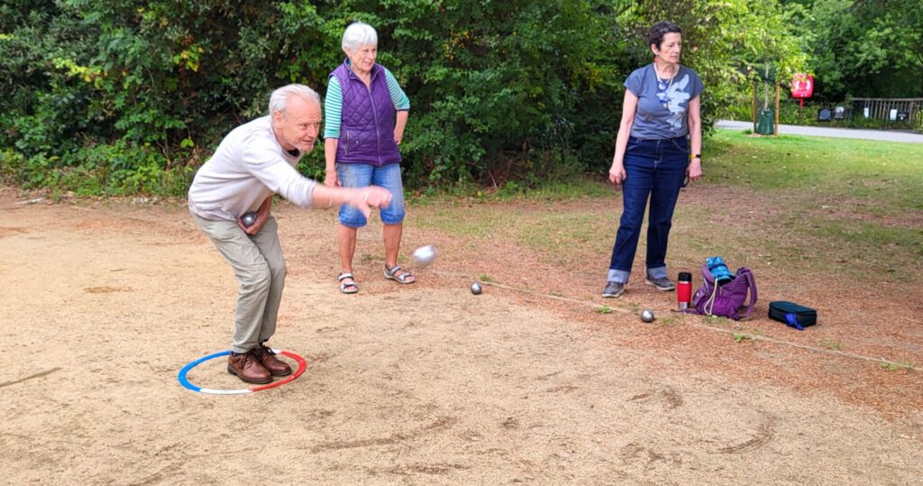 Photo of three members of the Dulwich & District u3a boules interest group. Credit: Juliet Barclay.