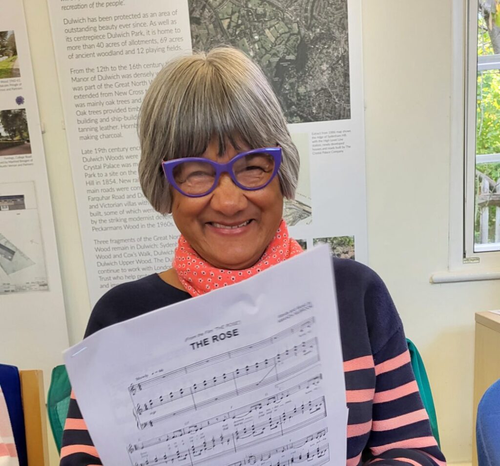 Photo of one of the members of the Dulwich & District u3a singing interest group. Credit: Juliet Barclay.